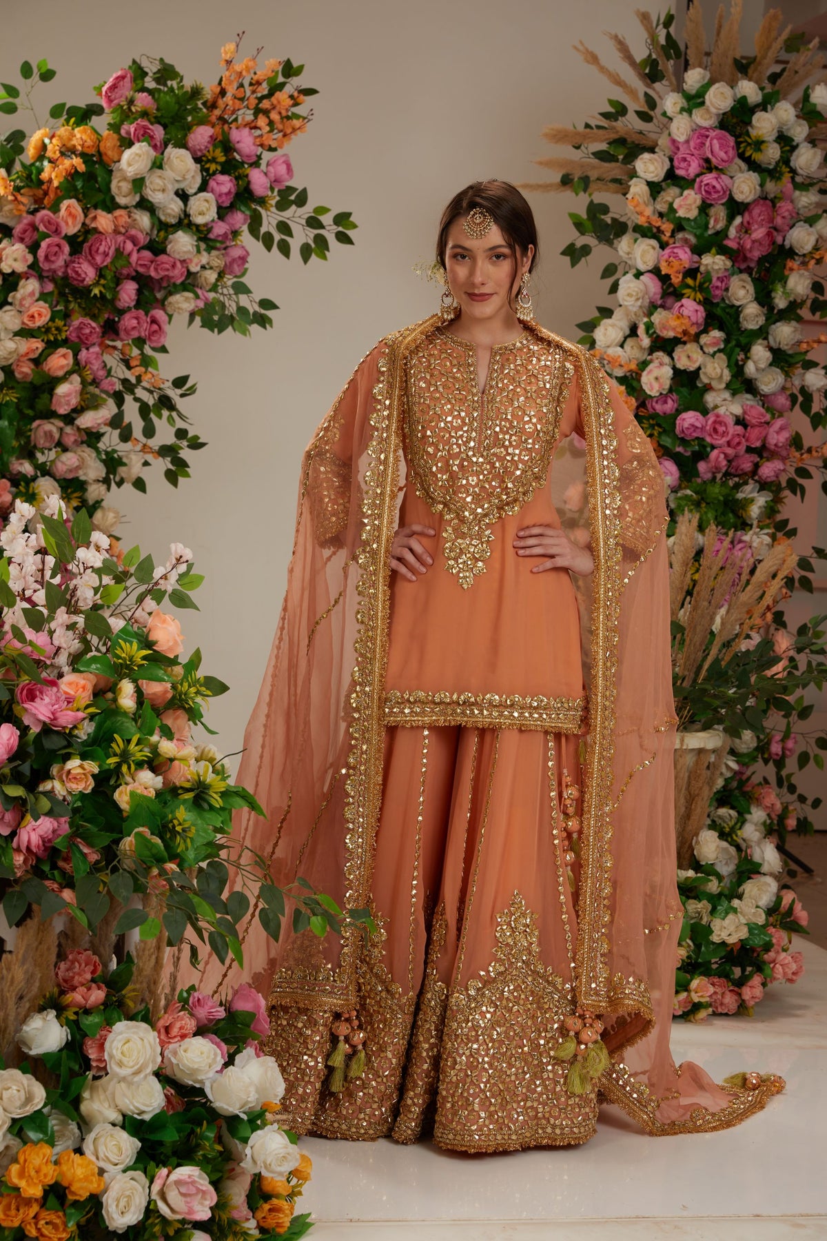 Peach kurta with sharara and Dupatta